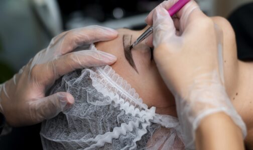 beautician-doing-microblading-procedure-woman-beauty-salon